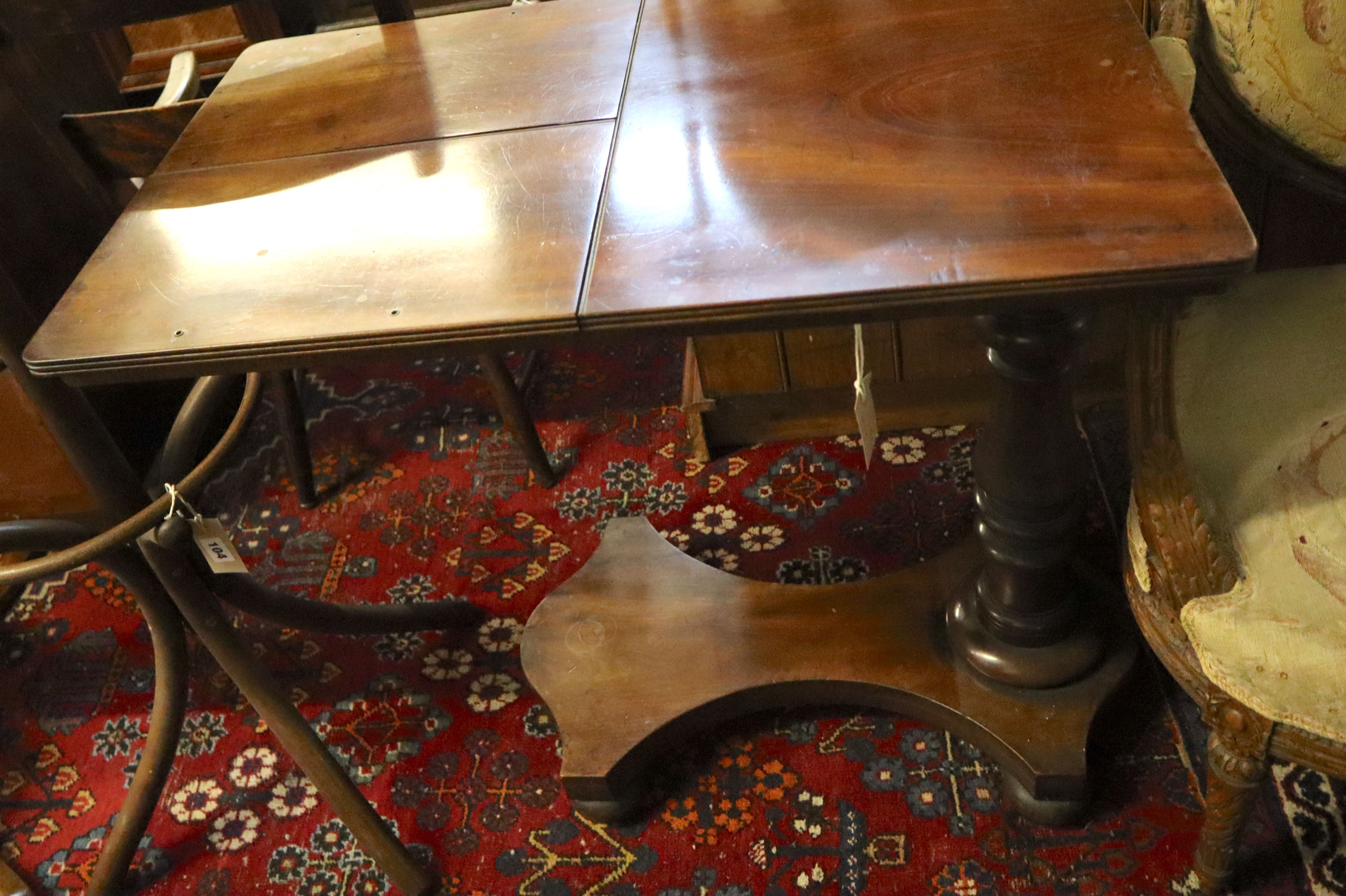 A Victorian mahogany adjustable reading table, the top fitted two adjustable sections, width 82cm, depth 50cm, height 78cm